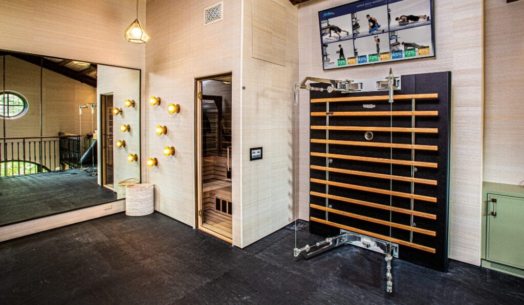 Forbes Magazine design home gym with Fitness Design Group Technogym sauna gym floor