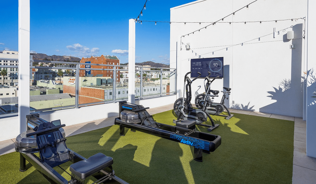 Outdoor Fitness Rooftop Hotel with Turf Flooring Functional Training Equipment and AktivTV