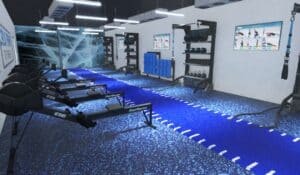 Fitness space designed for small group training with digital exercise guidance.